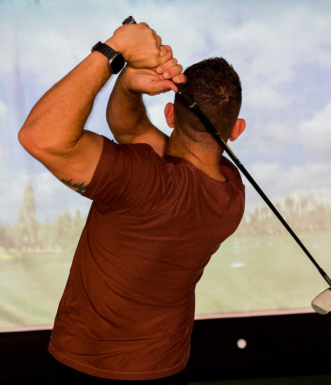 Indoor golf simulator at Motion Lab AZ fitness gym in Scottsdale Arizona